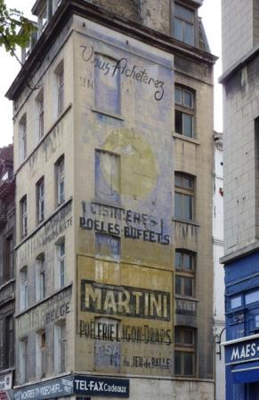 Hand painted sign advertising Martini across four stories of building