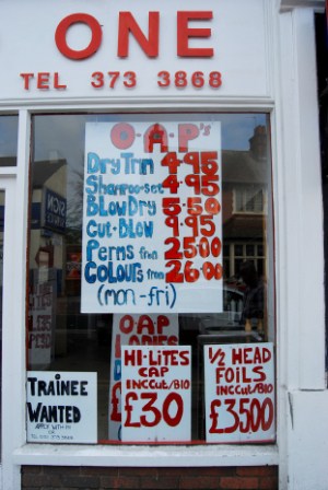 Hand lettering on display in hairdressers window