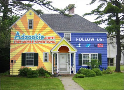 Adzookie painted advertising on houses