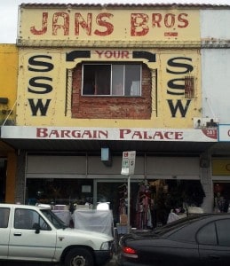 Hand painted sign on a building in Melbourne advertising Jans Bros