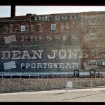 Hand painted sign on a wall for Dean Jones sportswear