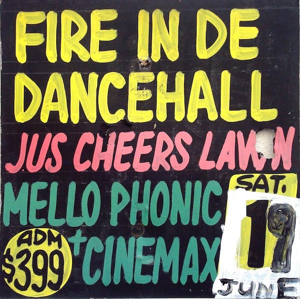 Hand-painted sign advertising a Jamaican dancehall event