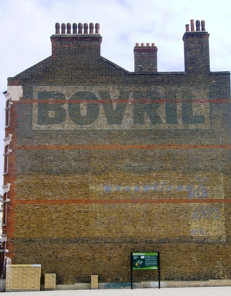 Fading painted sign on a wall advertising Bovril