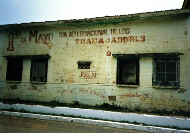 Painted sign, fading on a wall in Nicaragua