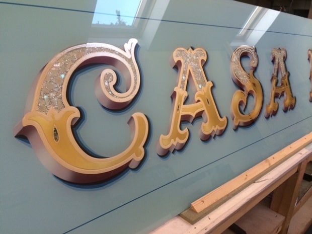 Painted and gilded signage for Casa Blue bar