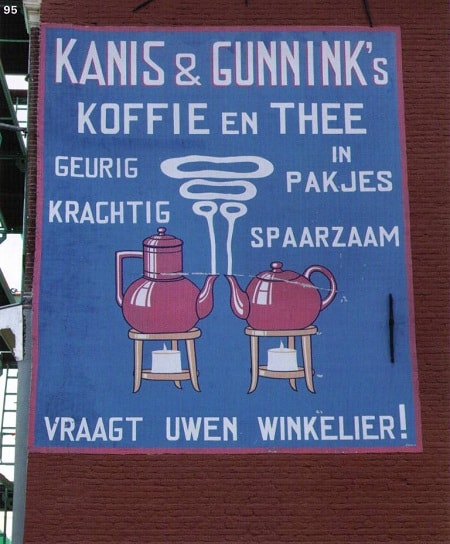 Restored painted sign advertising Knis & Gunnink coffee and tea house in Kampen