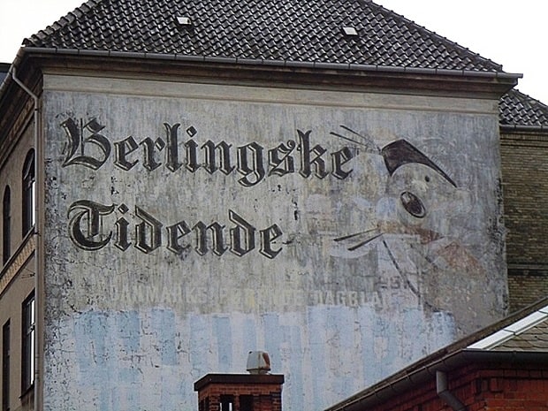 Fading advertisement on a wall for Berlinske Tidende newspaper