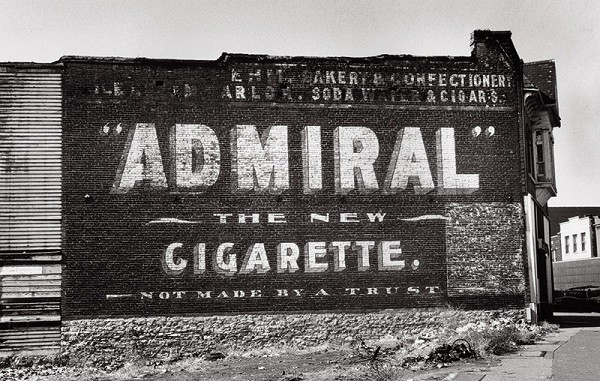 Fading painted advertising for Admiral Cigarettes on a wall