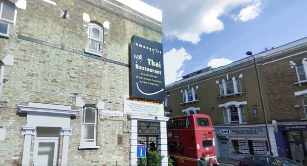 Google streetview showing mounted sign for Lemongrass covering a ghostsign