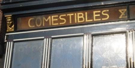 Gold shop fascia lettering saying Comestibles