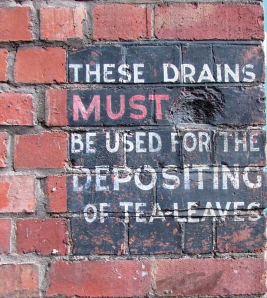 This one is in an alley that cuts through the middle of the William Morris Building and has an odd public service message. Presumably it once said 'must only' or something similar and there was a problem with people using the tea drain for non-tea substances...