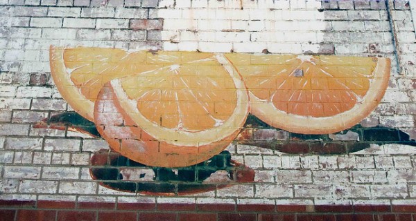 Painted oranges on a wall