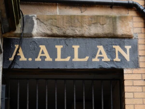 Painted sign for A.Allan