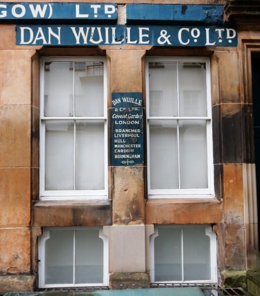 Painted signs for Dan Wuille & Co
