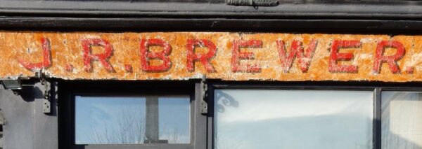 Painted shop front for J.R.Brewer
