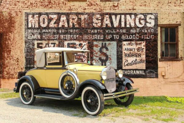 1929 Ford Model A Cabriolet Coupe and Mozart Savings sign, Pittsburgh, PA. Photo: Tom Pawlesh.
