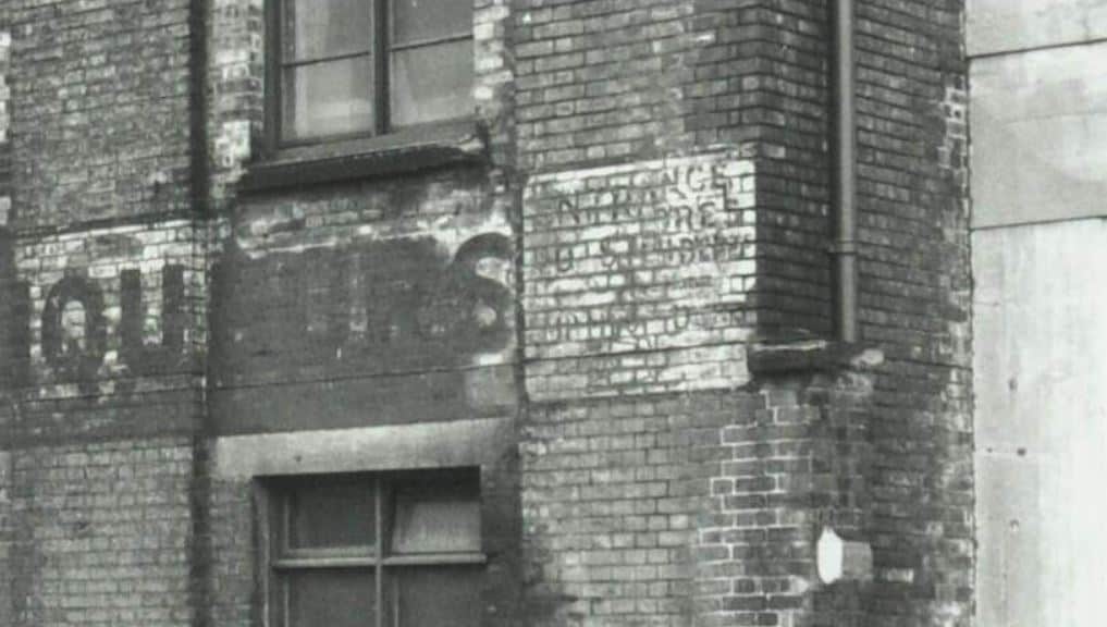 Detail from archival image of building group