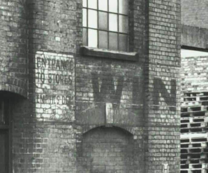 Detail from archival image of building group