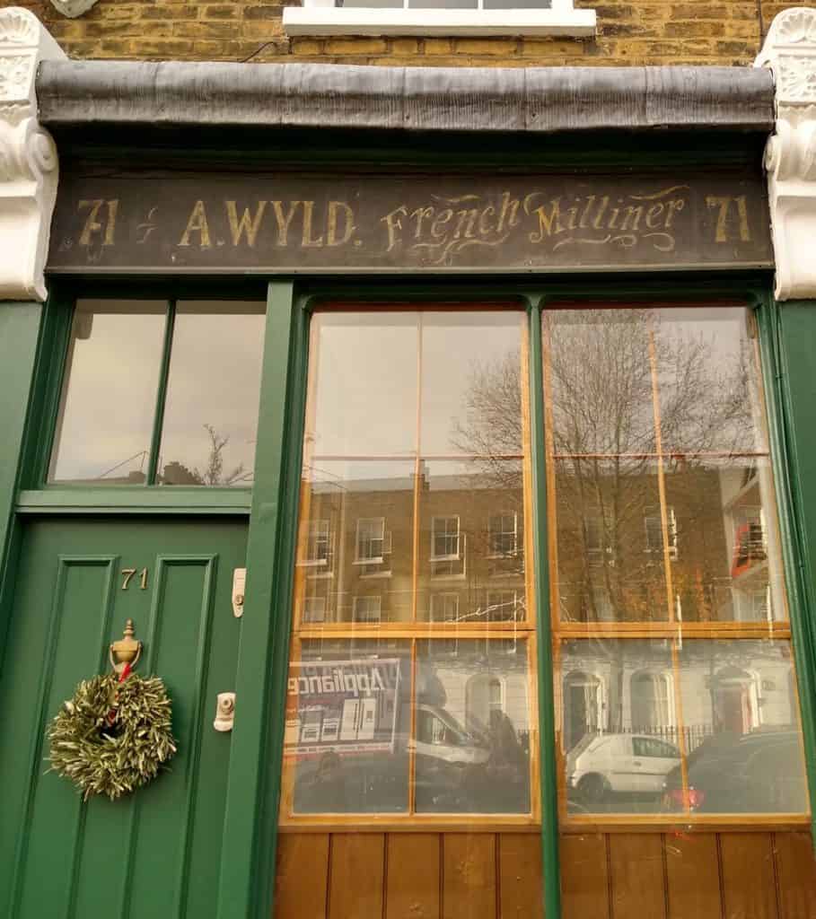 Painted shopfront for A. Wyld, French Milliner