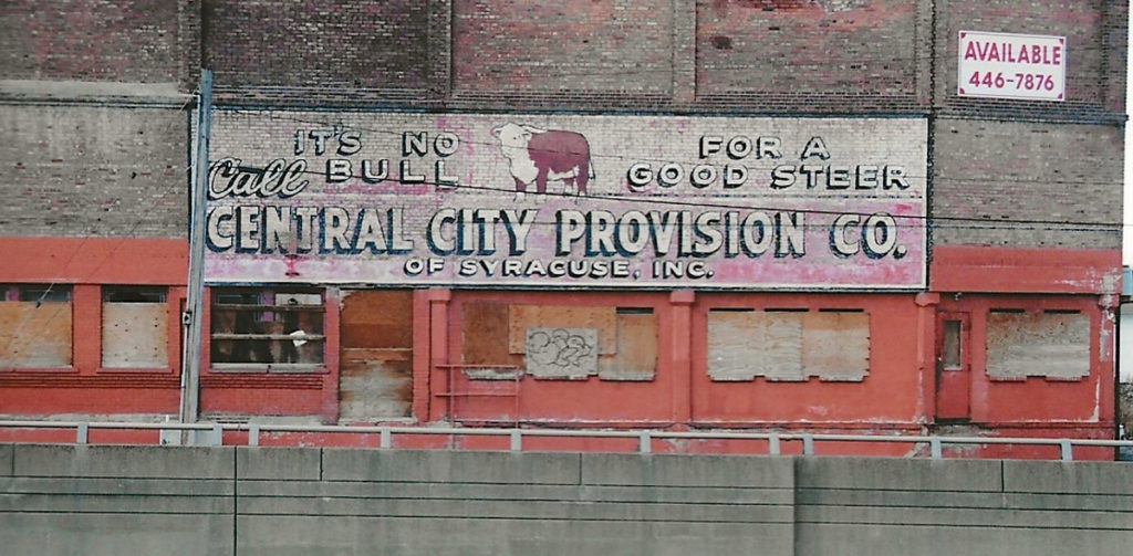Fading painted sign for the Central City Provision Co. Among the New York State Ghost Signs from Margherita Fabrizio.