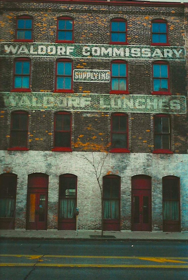 Fading painted sign for Waldorf Lunches. drawn from the New York State Ghost Signs photographed by Margherita Fabrizio.