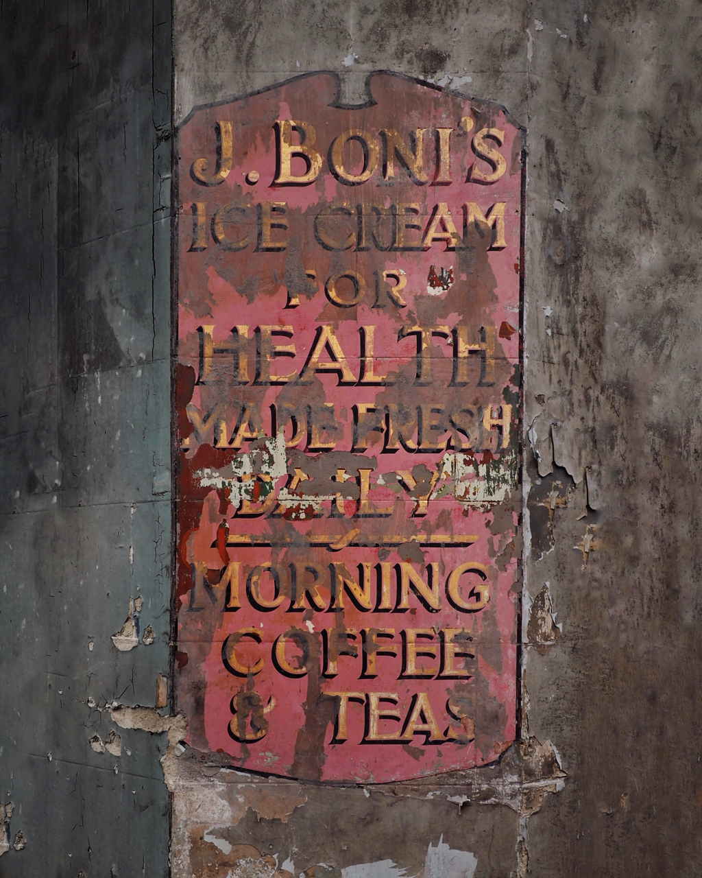 Fading painted sign promoting J. Boni's Ice Cream "for health".