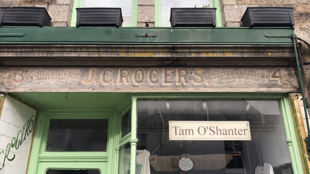 View of the surviving J.C. Rogers shop fascia sign taken from the street in front.